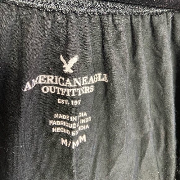 Black off the shoulder long sleeve w/ blue flowers - Picture 5 of 5